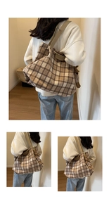 Detail of checkered wool tote bag with brown leather straps and plush bear charm decoration