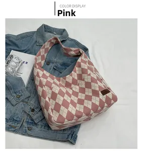 Pink and white checkered canvas shoulder bag featuring a leather Fashion patch detail