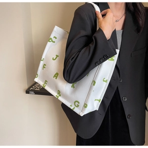 Fashionable large canvas tote bag with green graphic print for woman daily commuting