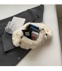 Detail of plush off-white handbag interior showing spacious capacity for daily essentials