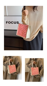 Detail of corduroy small tote bag with cherry print, wooden button and rope handle