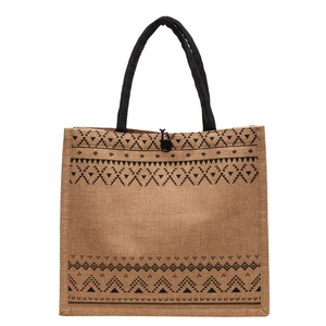 Minimalist large jute tote bag with black geometric ethnic patterns and top handles
