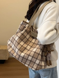 Large plaid wool shoulder bag with brown leather straps and a cute rabbit pendant