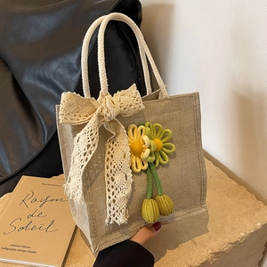 Lace bow beige jute handbag with crochet flower charm and thick white rope handles