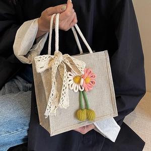 Linen bento tote bag with lace bow and crochet floral decor in pastoral style