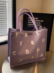 Purple large capacity canvas tote bag with white letter print and top handles for women
