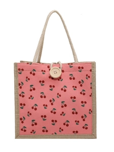 Pink corduroy tote bag with cherry print and natural jute sides with rope handles