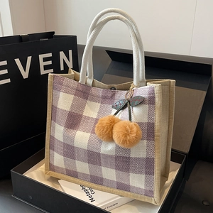 Large waffle pattern tote bag in purple and white checks with cherry plush pendant