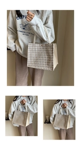 Detail of woven texture tote bag with cream canvas side and rope handle accents