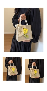 Detail of linen handbag featuring a 3D yellow flower and elegant lace bow decoration