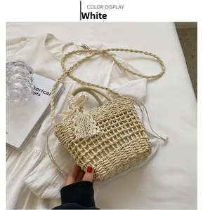Detail of woven straw bag with cream lace bow and drawstring closure against lifestyle decor