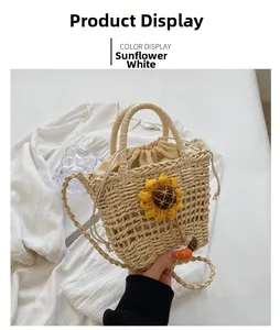 Close-up of handmade woven straw beach bag with sunflower decoration and drawstring closure