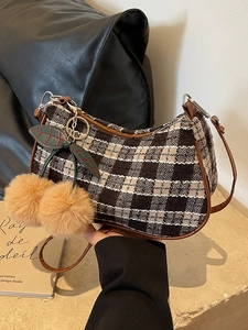 Classic checkered tweed underarm bag with cherry fur ball pendant and brown leather straps