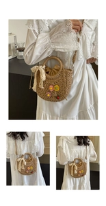 Detail of handmade woven straw bag with floral embroidery and lace bow decoration