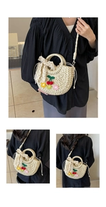 Detail of straw woven bag featuring crochet cherry decor and a large lace bow accent