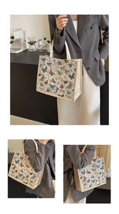 Détail de l'imprimé papillon vintage sur un sac fourre-tout en toile avec anses