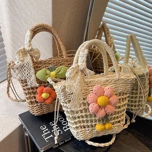 Handmade woven straw handbags set with floral accents and lace bows for summer vacations