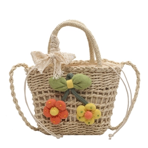 Handmade straw mini handbag with floral accents and lace bow for summer beach vacation
