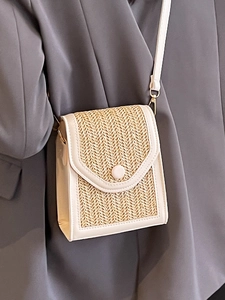 Mini straw woven crossbody bag in beige with cream white leather trim and strap