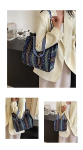 Detail of blue ethnic jacquard canvas tote bag with geometric patterns and wide straps