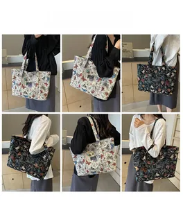 Detailed views of a large canvas tote bag featuring vibrant butterfly prints and shoulder straps