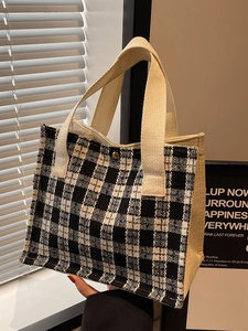 Japanese style black and white checkered woven handbag with top handle and metal buckle