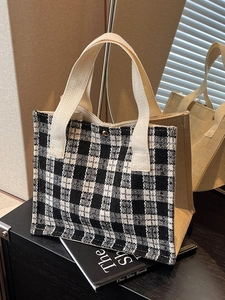 Minimalist checkerboard tote bag with khaki linen side panels and cream woven handle