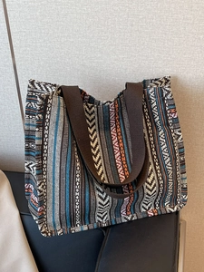 Ethnic geometric woven tote bag with wide straps for daily commuting and large capacity