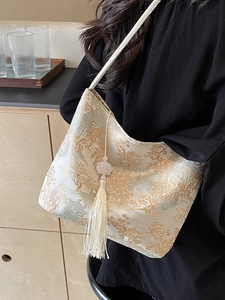 Elegante borsa a secchiello in seta jacquard con motivo paesaggistico per l'estate 2024