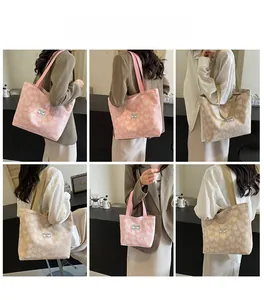 Pink and beige tote bags with heart patterns shown in various lifestyle poses