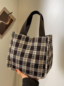 Classic brown checkered tote bag with high-end fabric texture and webbing handle