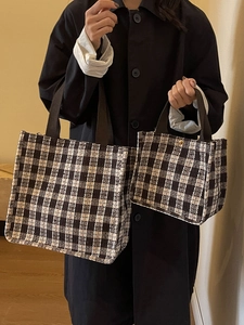 Classic checkered tote bag set with black and white woven pattern and top handles