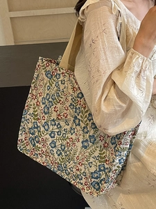 Retro floral jacquard tote bag for women with blue flower patterns and sturdy canvas straps