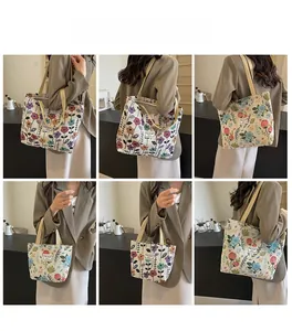 Detailed views of floral canvas tote bags in different sizes with zipper closure
