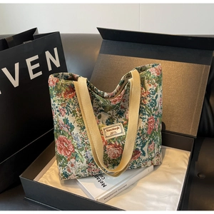 Exquisite floral embroidered canvas tote bag presented in a premium black gift box