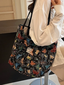 Black canvas tote bag with colorful butterfly embroidery and large capacity for women