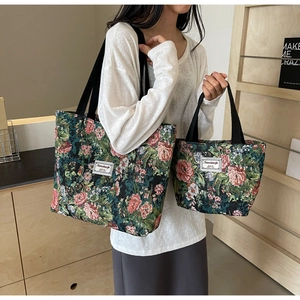 Detail view of floral canvas tote bag set with two sizes and vintage flower pattern