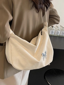 Sac fourre-tout minimaliste en cuir beige avec pendentif papillon brillant pour femme