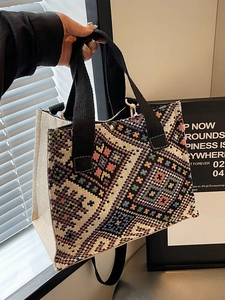 Ethnic style geometric jacquard tote bag with white canvas and black handles