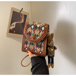 Retro vertical crossbody phone bag with geometric pattern and cute rabbit doll charm