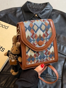 Vintage vertical crossbody phone bag with geometric jacquard and plush rabbit pendant