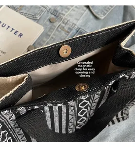 Detail view of ethnic canvas tote bag featuring secure magnetic clasp closure