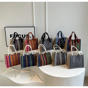 Detailed group view of ethnic woven tote bags with bohemian geometric patterns
