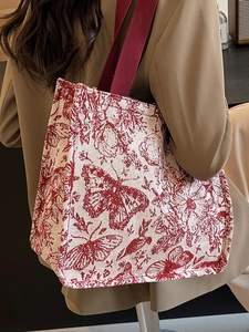 Knitted tote bag with red butterfly patterns and deep red straps for women