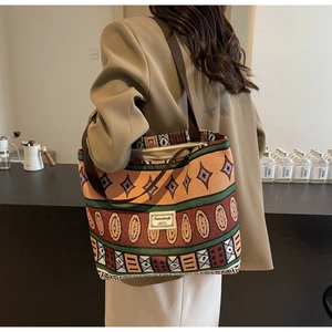 Detail of the ethnic geometric patterns and sturdy woven straps on this large canvas tote