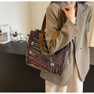 Detailed weave of the bohemian geometric pattern on a large vintage tote bag