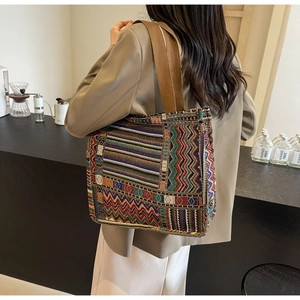 Detail of bohemian geometric woven pattern on the large capacity vintage tote bag