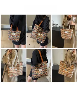 Detail view of woven geometric canvas tote bags in various sizes and retro color patterns