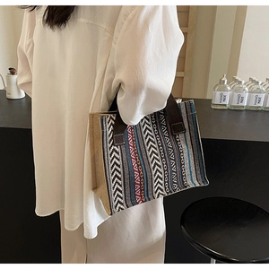 Detail of ethnic tote bag showing woven geometric patterns and durable jute side panels