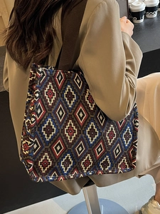 Vintage jacquard tote bag with geometric diamond patterns and wide shoulder straps